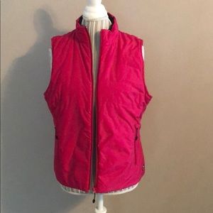 Reversible puff vest. Pink and black.